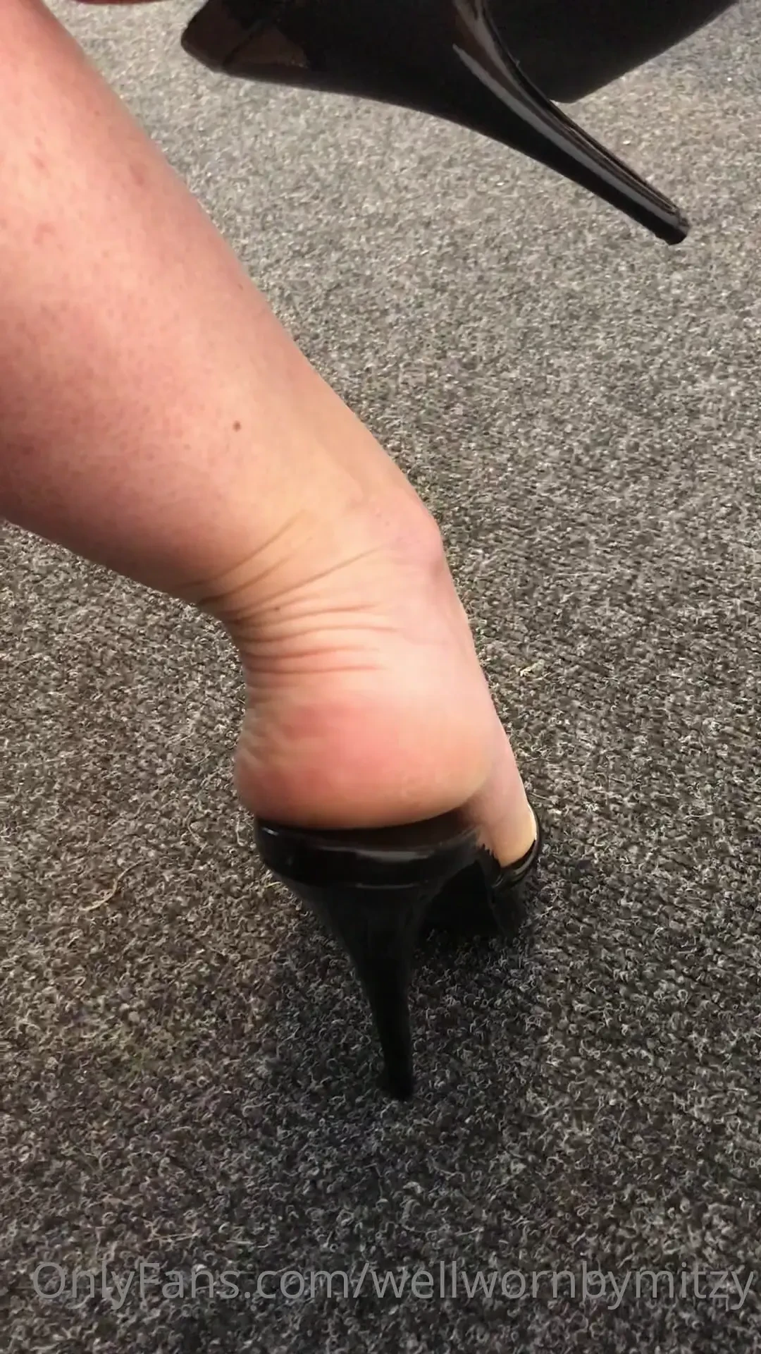 6 inch mules from behind concentrating on the creases on my heels 