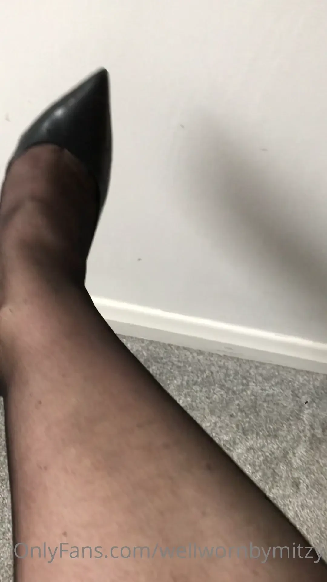 Black sheer nylons and black stilettos 