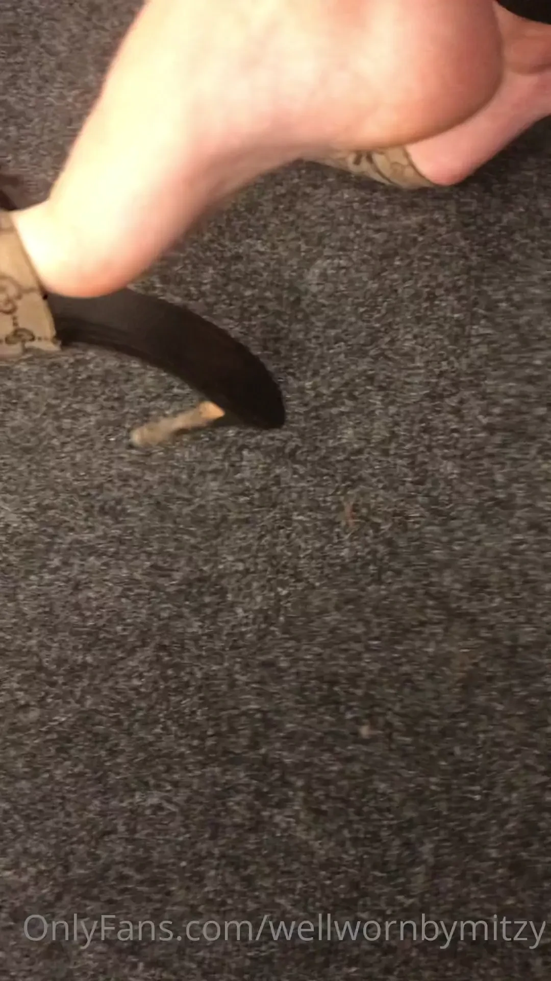 Gucci print pointed toe mules dangling including view from underneath 