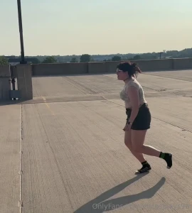 A glimpse of irl elf doing a cartwheel tipsy on the roof of a parking