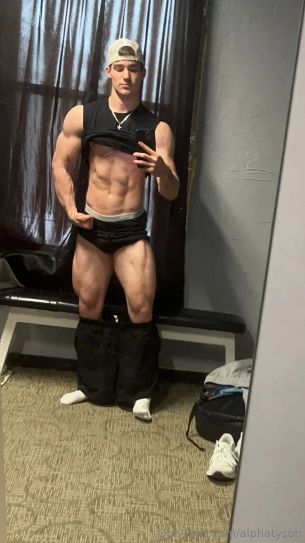 Just a jacked frat bro showing off perfect abs and bulge in the locker 
