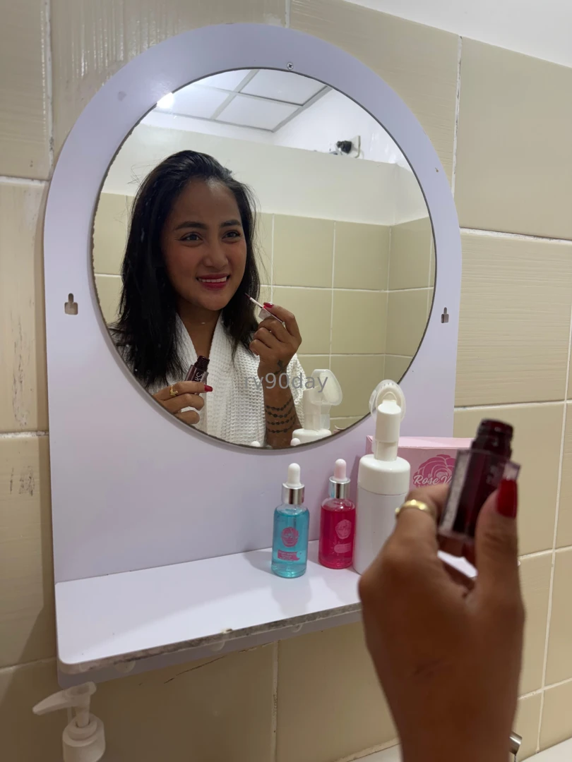 Painting my lips red so you know where to aim 