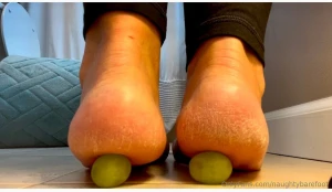 Dry cracked heels crushing and stomping grapes