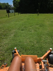 Mowing my horse pastures and working on my tan new content will be out