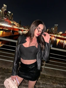 The city at night streetlight dancing on the water reflected in the