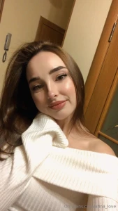 A cozy sweater a gentle smile and a little magic in my eyes i m