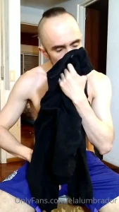 Smelling his clothes