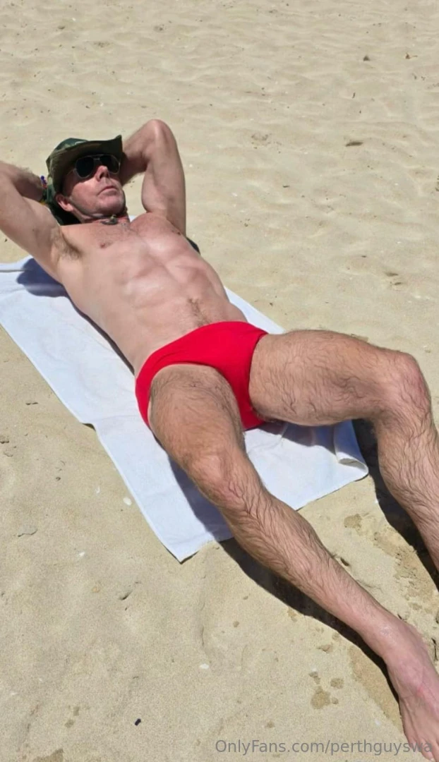 A day on the beach trying to get a tan line which i never get 