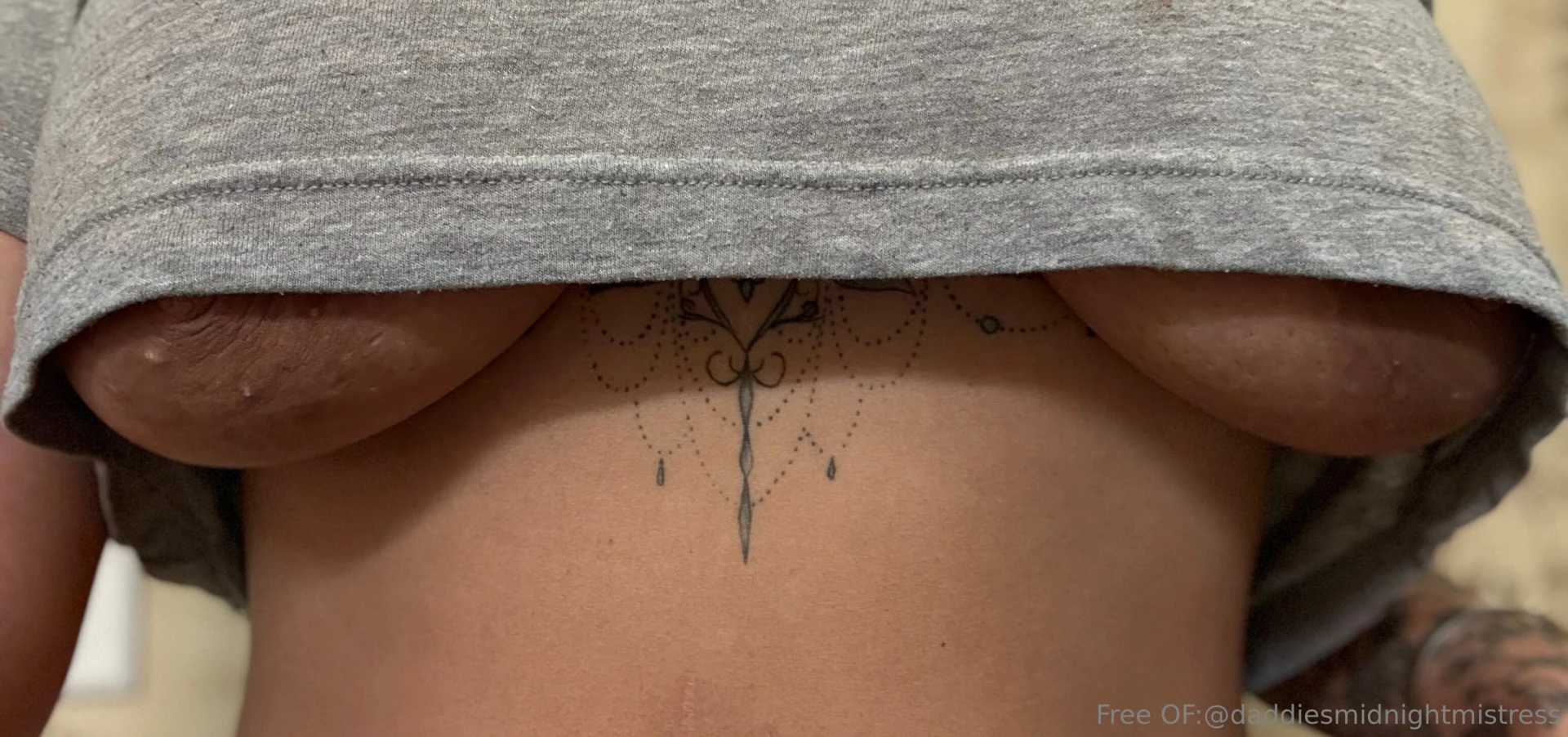 Oops looks like my boobs couldn t wait to say hi from under this shirt 