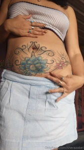 My tattoo drives you crazy tattooed belly button and tummy there s