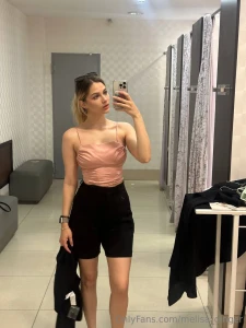 Tugging at the waistband of my shorts just enough to tease how far do