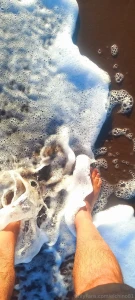 I love the sand and the sea on my feet