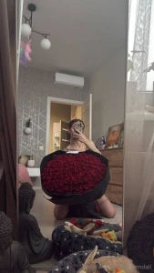 Flowers adorn a woman