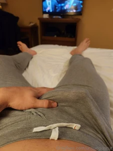 Grey sweatpants half chub in the hotel room
