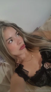 Lips glossed skin glowing and draped in just enough to keep things