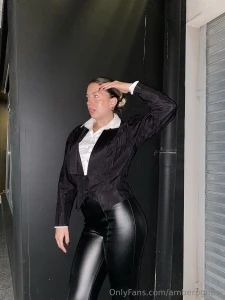 Draped in all black with a hint of white peeking through clean bold