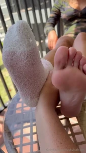 I love having a personal foot slave he always helps take my socks off