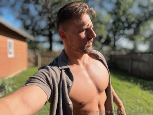 Sun s out shirt open chest out just enough to make you wonder what