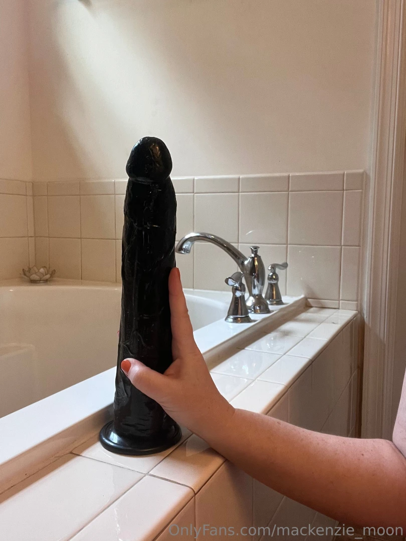 Watch me stretch my with this massive dildo how far down do you think 