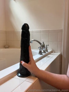 Watch me stretch my with this massive dildo how far down do you think