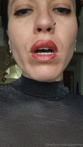 The contour of my lips their flesh and shine their taste when i smoke