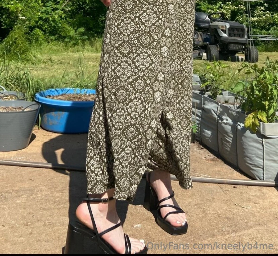Little glimpse of me tending to my garden in heels 