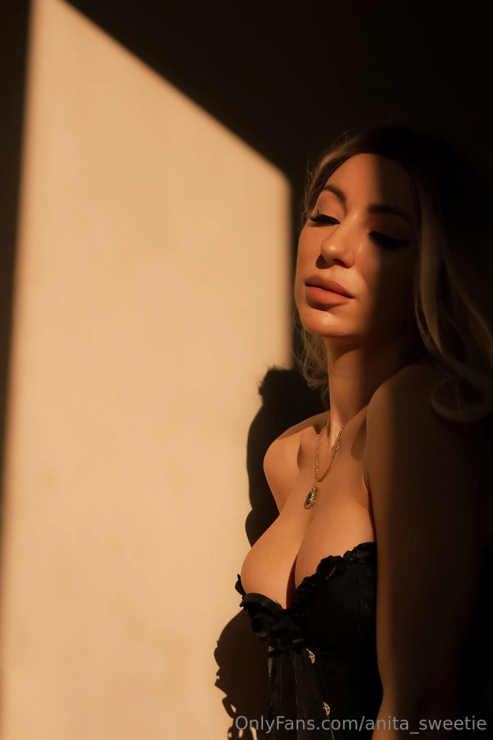 Peeking through the shadows letting just a hint of my seductive curves 