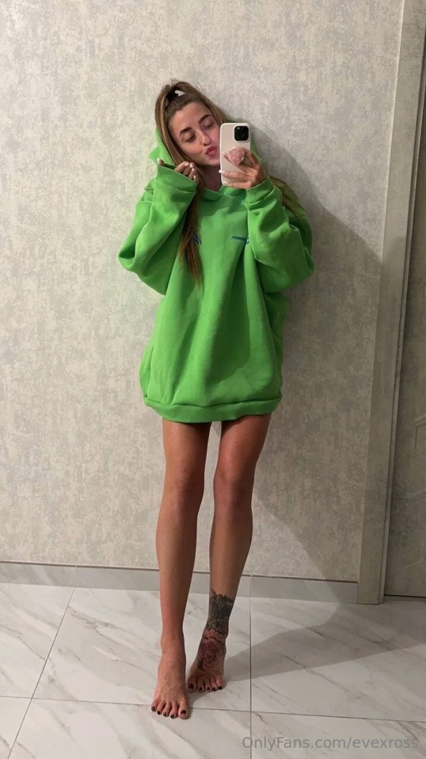 Green hoodie day barefoot and happy 