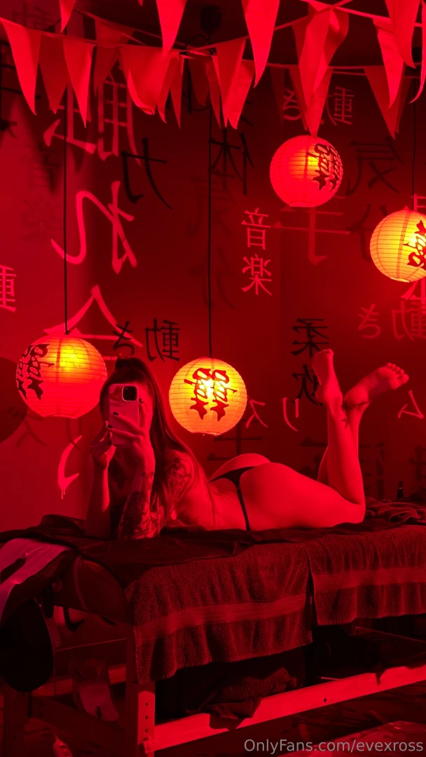 Melting on the massage table surrounded by lanterns this red glow 