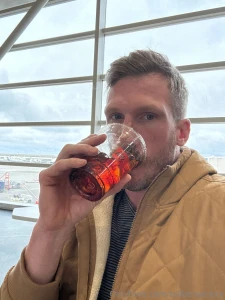 In the airport in detroit sipping on caw-fee but in search of