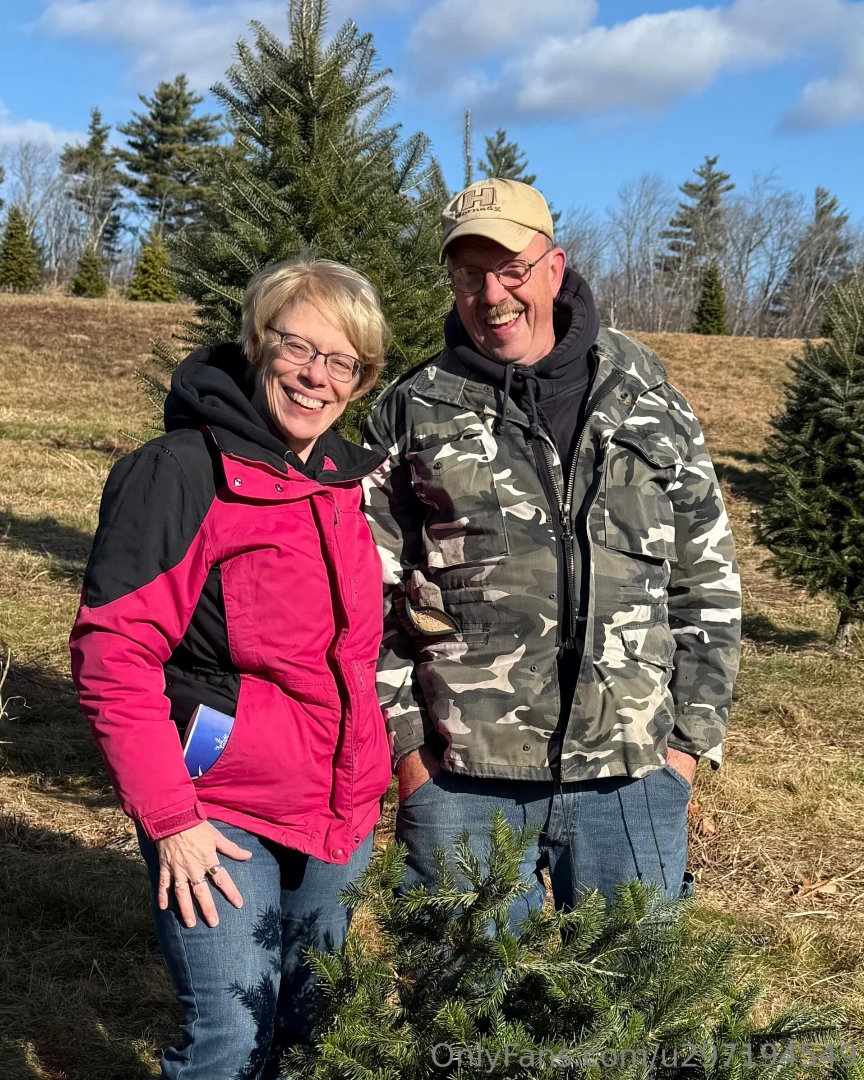 Lisa and i out at the tree farm cutting a christmas tree 