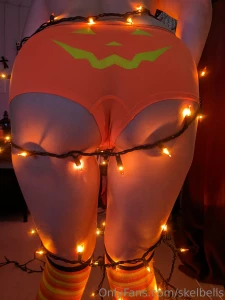 A very happy ass wrapped in lights