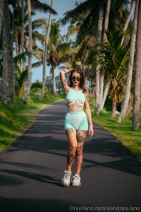 Bali greets me with green palm trees rays of sunshine and a wind that