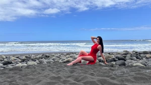 Beach with black squeak and me in a red dress