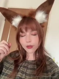 Playing with cosplay ears and makeup