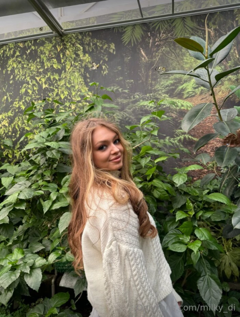 Strolling through the enchanting garden i m adorned in an elegant 