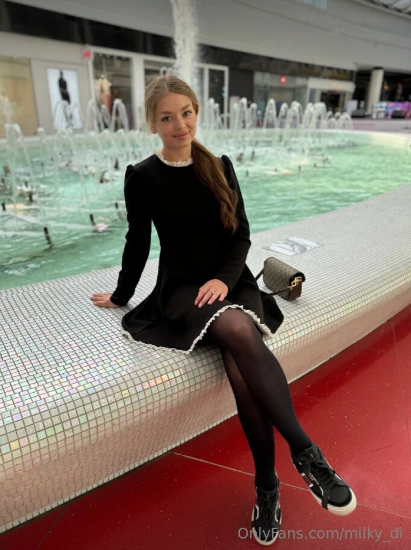 Step into the scene like a midnight dream draped in sleek black 