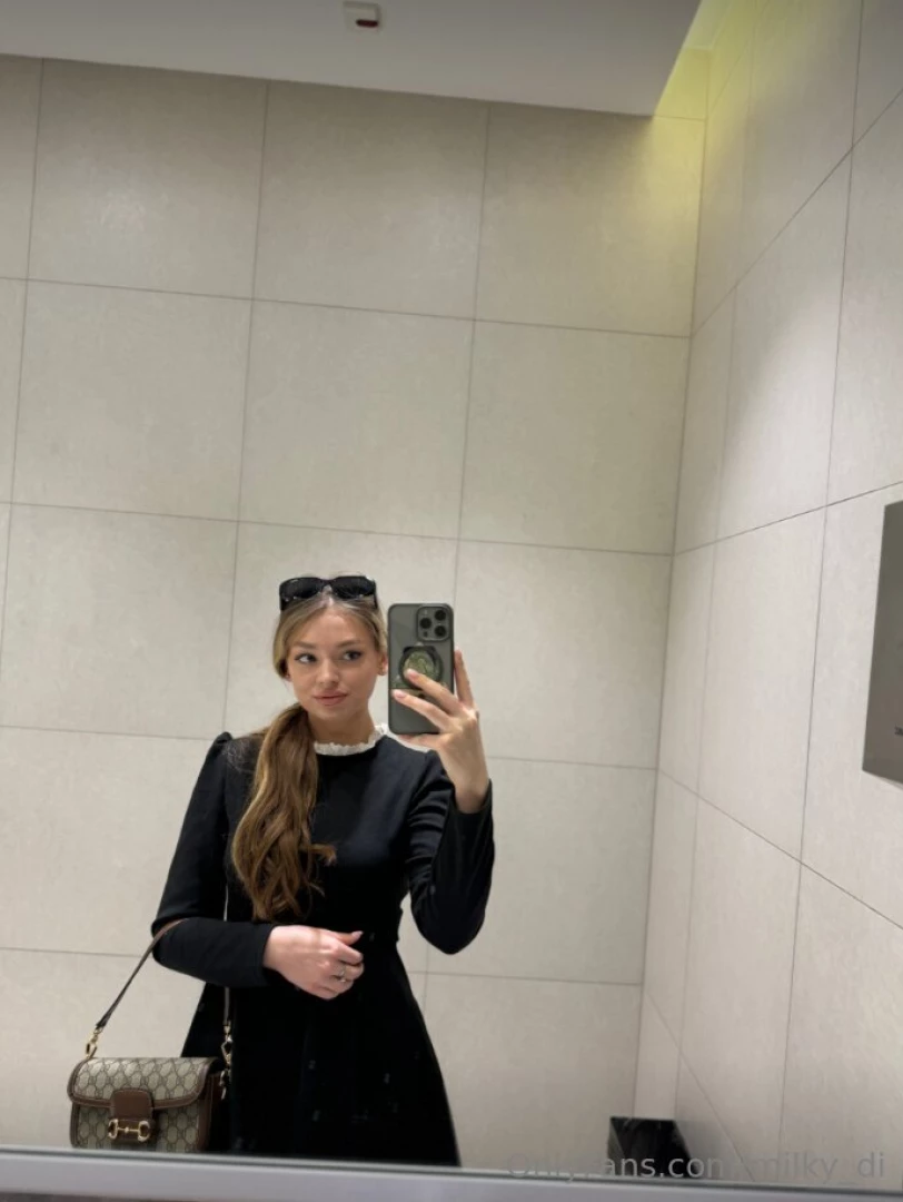 As you stand before the mirror a vision of style and sophistication 