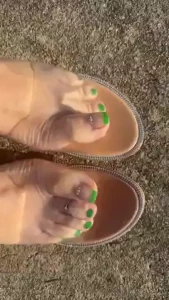 Clear slides and green toes