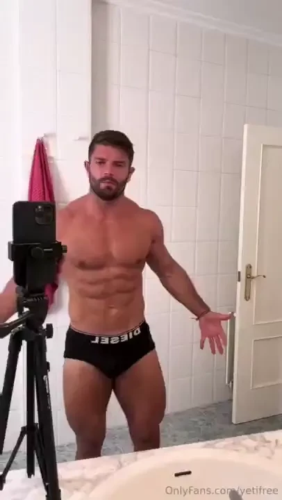 A fan directed video where i show off in the mirror flexing and 