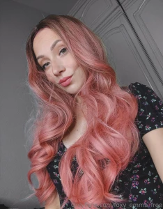 Pink hair and inner light an ode to creativity and boldness in this