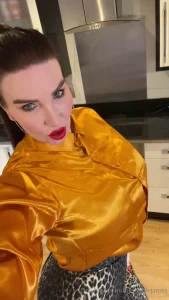 Gold satin and leopard print complete with red lipstick to suck your