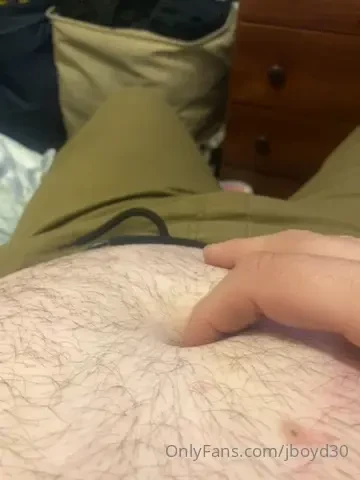 Playing with my bellybutton 