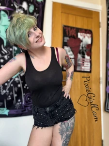 Just an emo chick stripping to fully nude for you