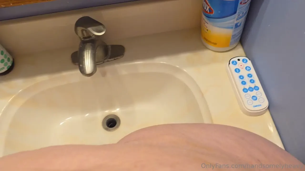 Filling the sink up with my massive belly 