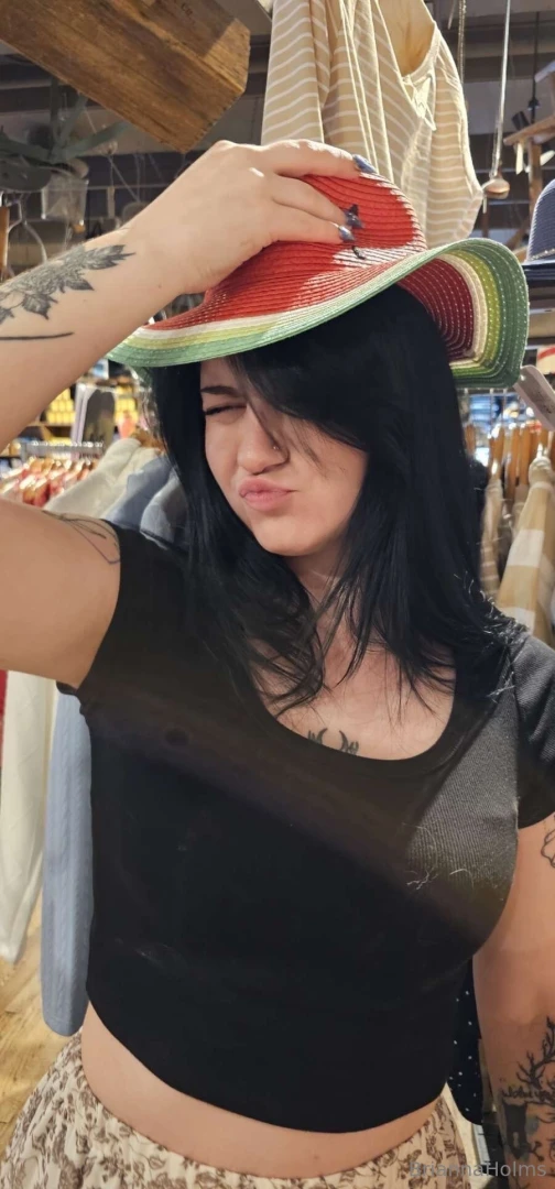 Trying on hats but let s be real i m the real treat under the shade 