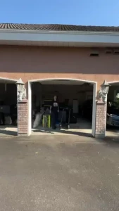 Piper cleans the garage