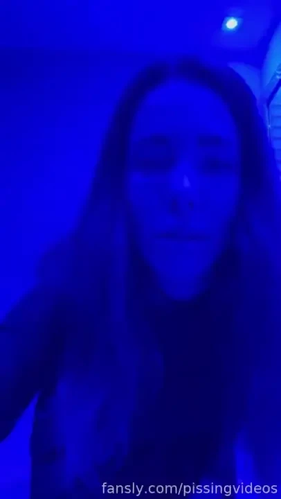 Peeing in a blue lit toilet in a public bar blue light pee piss kink 