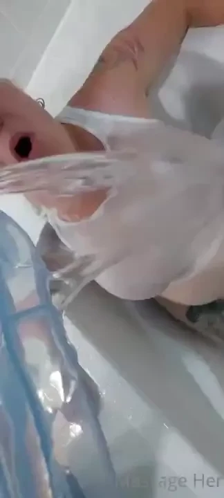 Ha 2nd time seeing this sexy fun woman white tank in the tub water ice 