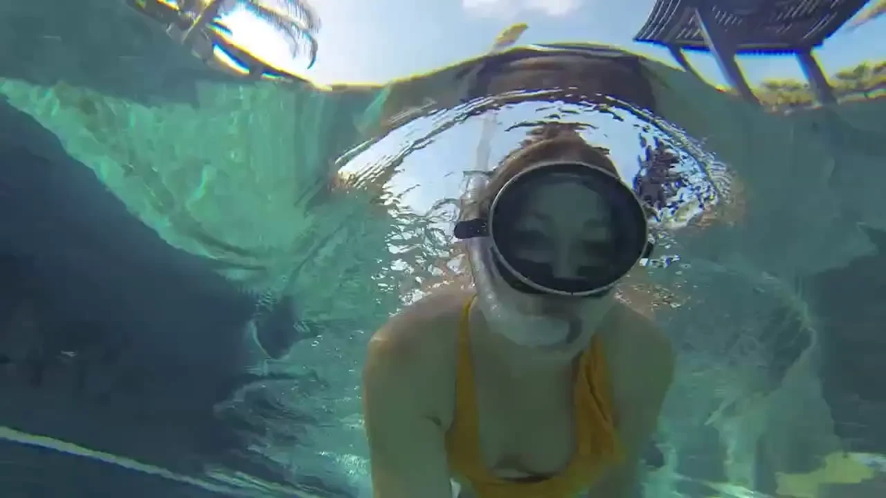 Having a snorkel a round the pool like a mermaid ha ha 